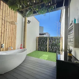 Coastline Retreats: Jungle-themed Seafront Garden Apartment Bournemouth